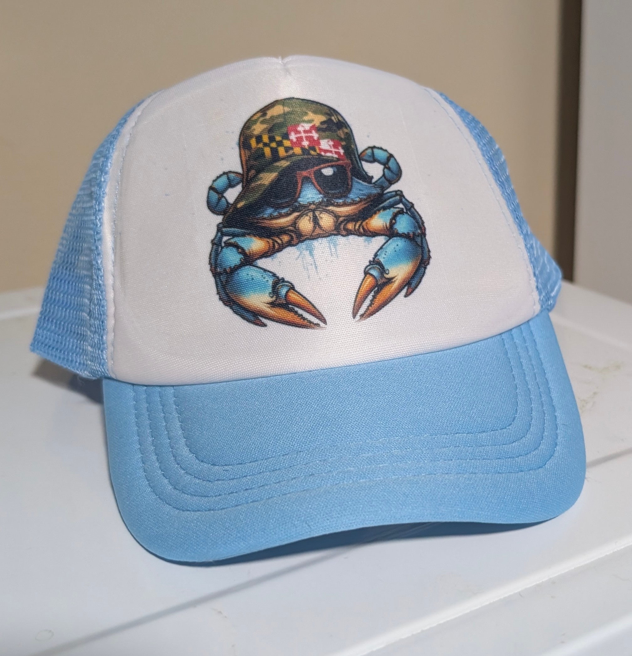 Blue Crab – Light Blue & White Sublimated Trucker Hat