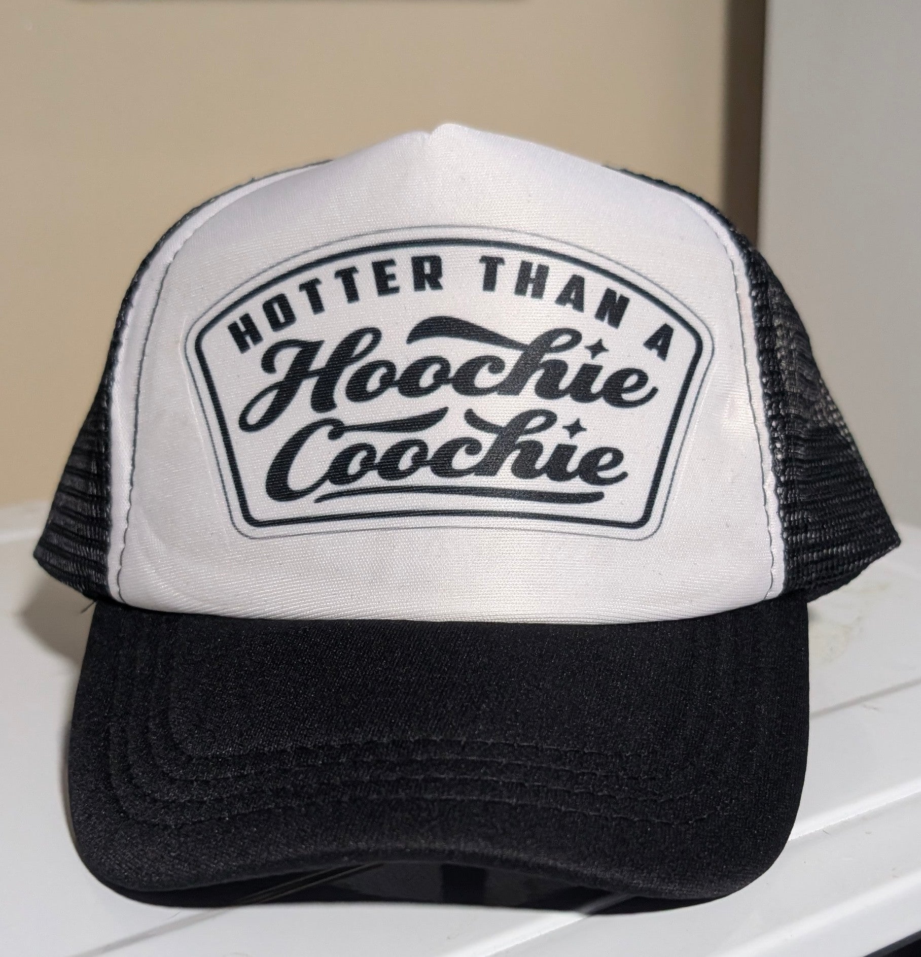 Hotter Than a Hoochie Coochie – Black & White Sublimated Trucker Hat