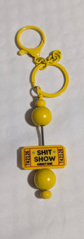 Shit Show Admit One Keychain
